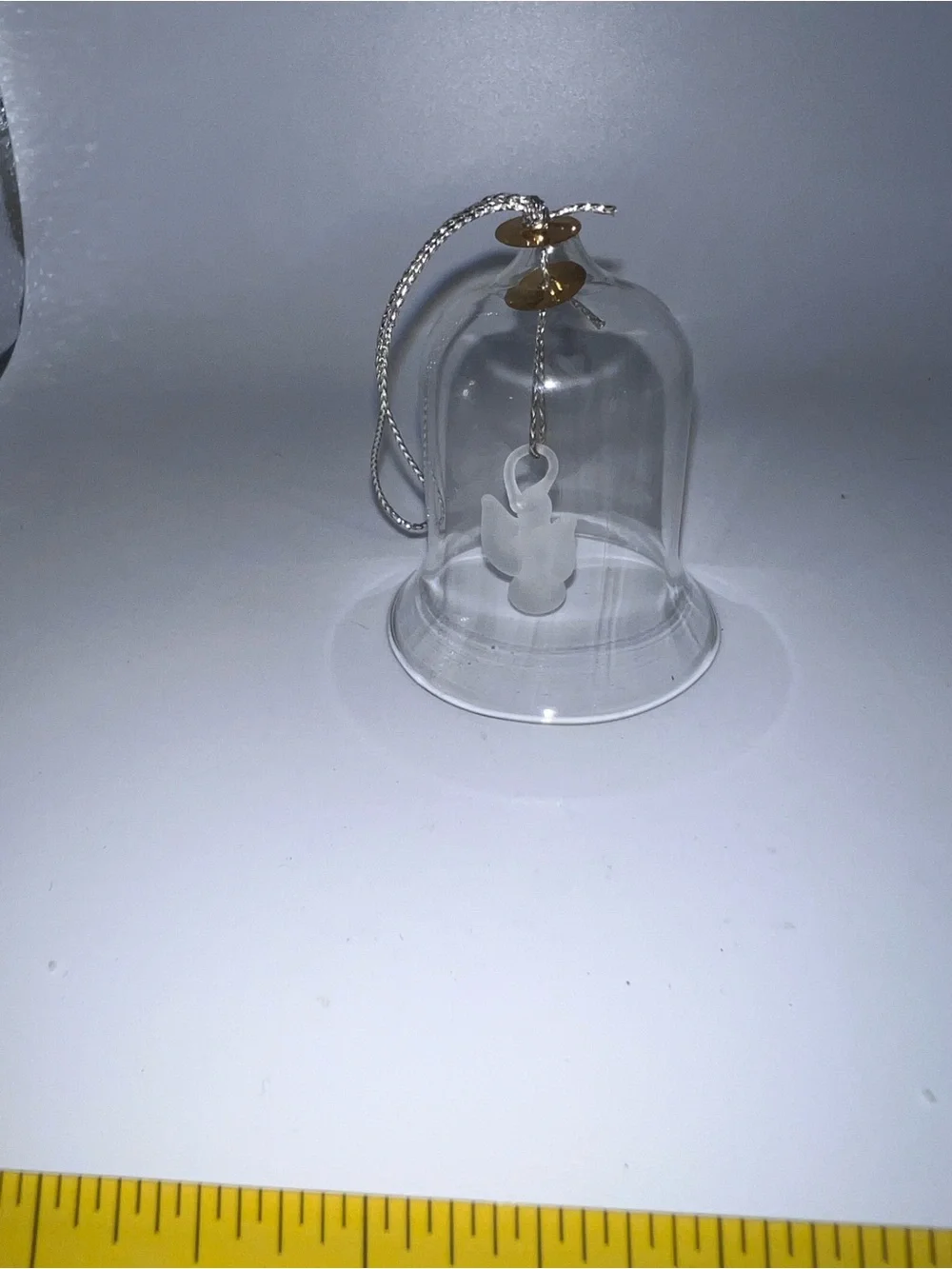 Small glass bell with angel
